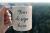 موکاپ PSD فتوشاپ ماگ سفید براق در دست خانم با زمینه جنگل با قابلیت ویرایش زمینه و متن جهت نمایش لوگو و متن