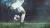 عکس JPG با کیفیت فوتبالی شامل شوت کردن توپ فوتبال توسط بازیکن در زمین چمن خیس 21239