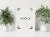 موکاپ رایگان قاب عکس از نمای نزدیک به همراه گلدان و گیاه با تم سفید فایل PSD لایه باز 21550