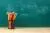 عکس  JPG باکیفیت از تخته سیاه مدرسه و مدادرنگی داخل جا مدادی و جا برای نوشتن 22131