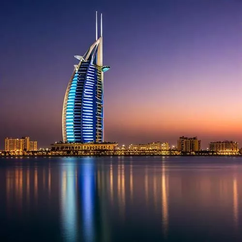 عکس با کیفیت از شهر دبی و ساختمان با نور آبی و سبز روشن در شب 27567