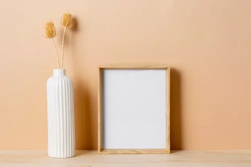 فایل PSD موکاپ قاب عکس مینیمال با نور گرم 25702