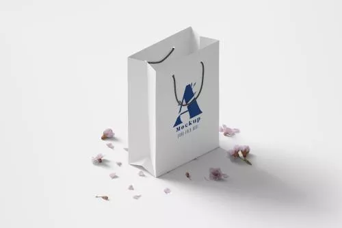 موکاپ جعبه مقوایی و ساک دستی و هندبگ مناسب برای ارائه لوگو و آرم شرکت های تولید کننده پوشاک و لباس فایل PSD لایه باز 21491