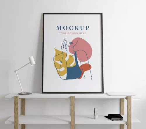 موکاپ فتوشاپ تابلو رایگان در اتاق با تم سفید به همراه میز و چراغ مطالعه فایل PSD لایه باز 21539